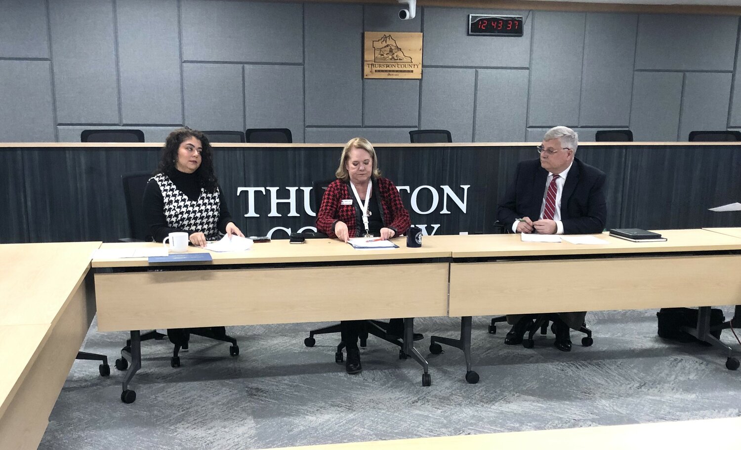 The certifying board before the swearing-in. From left to right councilmember Carolina Mejia, county auditor, Mary Hall, County prosecutor, John Tunheim.
